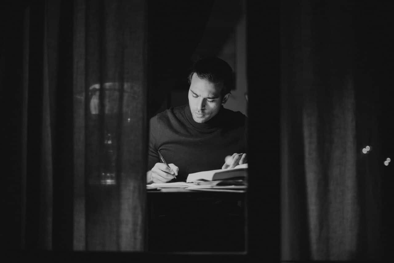 author writing on desk